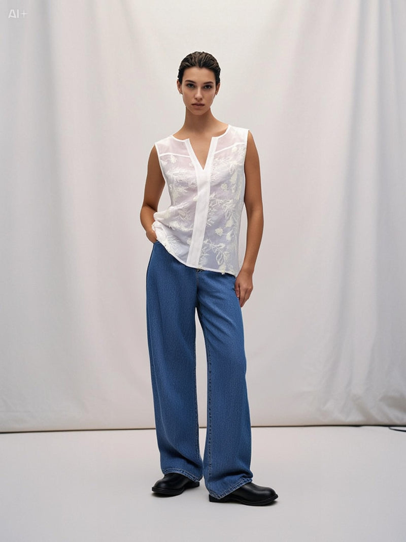 CAMICIA SMANICATA CON FIORE TRIDIMENSIONALE